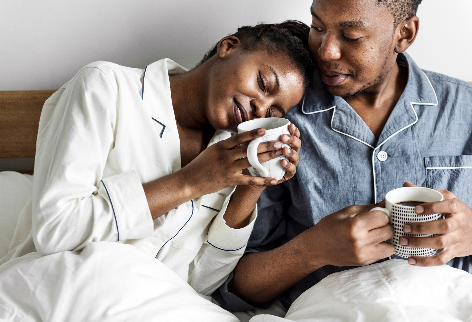 husband and wife enjoyingf cup of coffee after good nights rest with sleep apnea